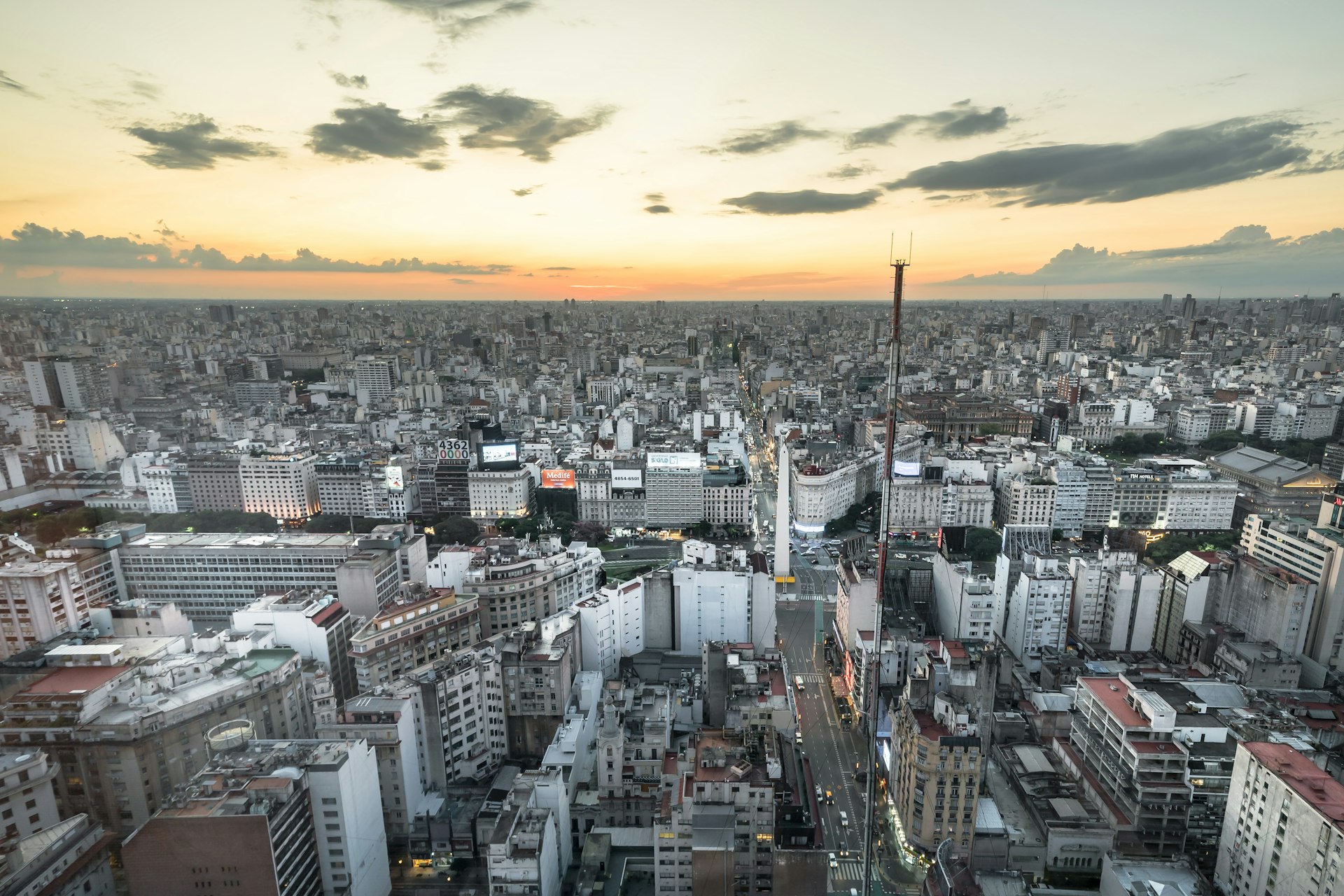 Aerial view of the Buenos Aires skyline at sunset with high-rise residential buildings